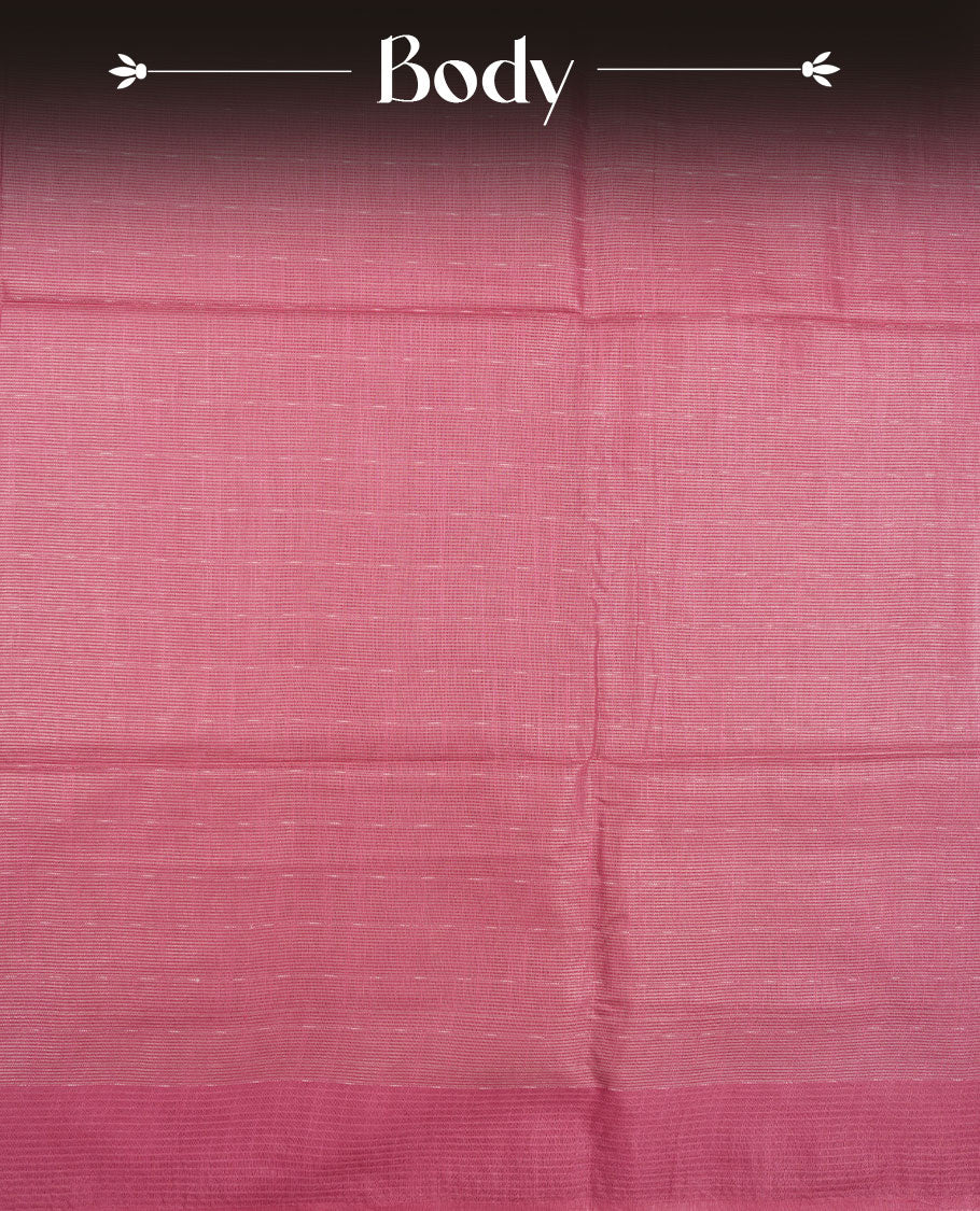 Light onion colour semi jute saree highlighting gold zari striped body, without border and paired with matching blouse.