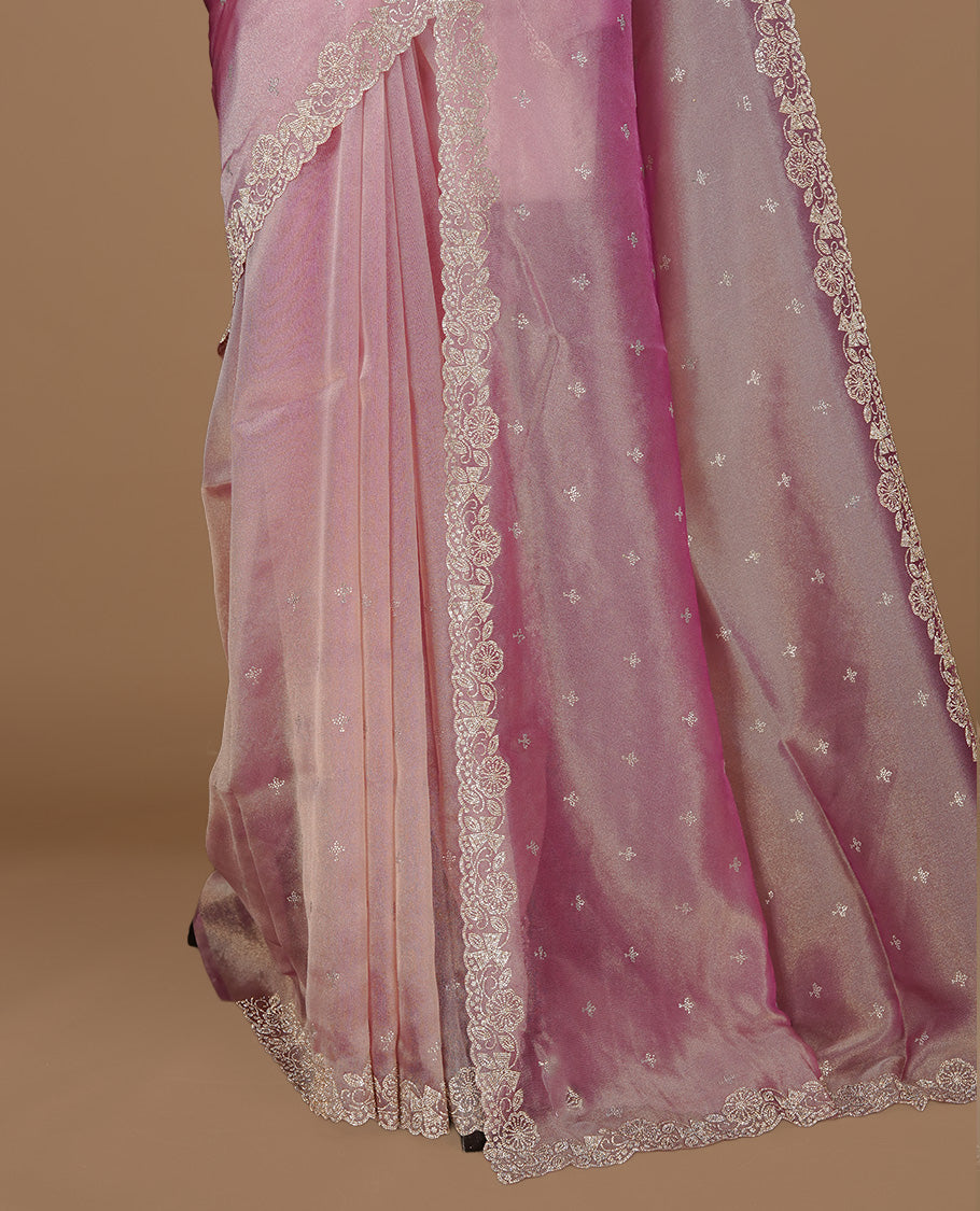 Pinkish purple colour designer saree featuring stone worked body, stone worked border, paired with matching blouse piece.
