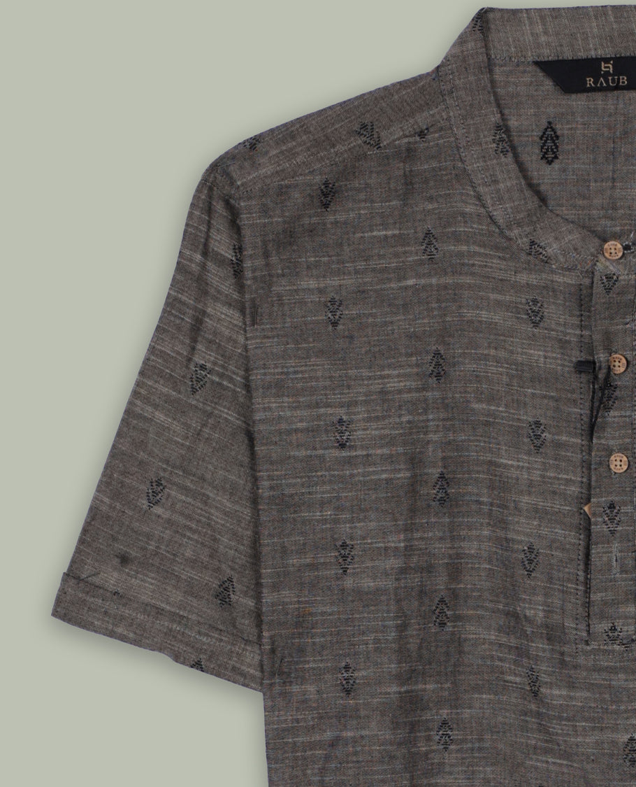 Charcoal grey colour short sleeve shirt featuring a subtle woven texture and minimalist embroidered motifs,Designed with a chinese collar , this piece offers a refined yet casual look for everyday wear.