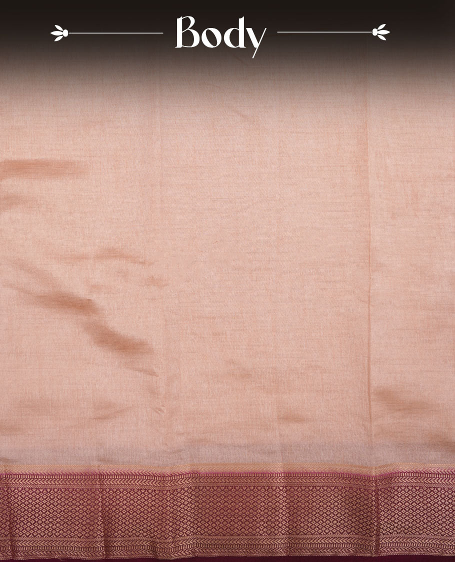 Cream colour tussar silk saree featuring elegant plain body, contrast Maroon colour border with gold zari, comes with matching blouse piece.