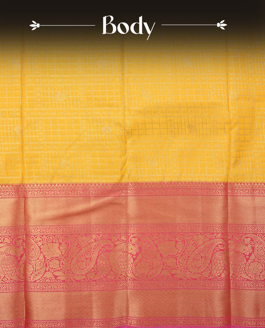 Yellow colour semi wedding saree featuring gold zari check with peacocok motifs on body complemented by contrast magenta colour with traditional border, comes with macthing blouse piece.