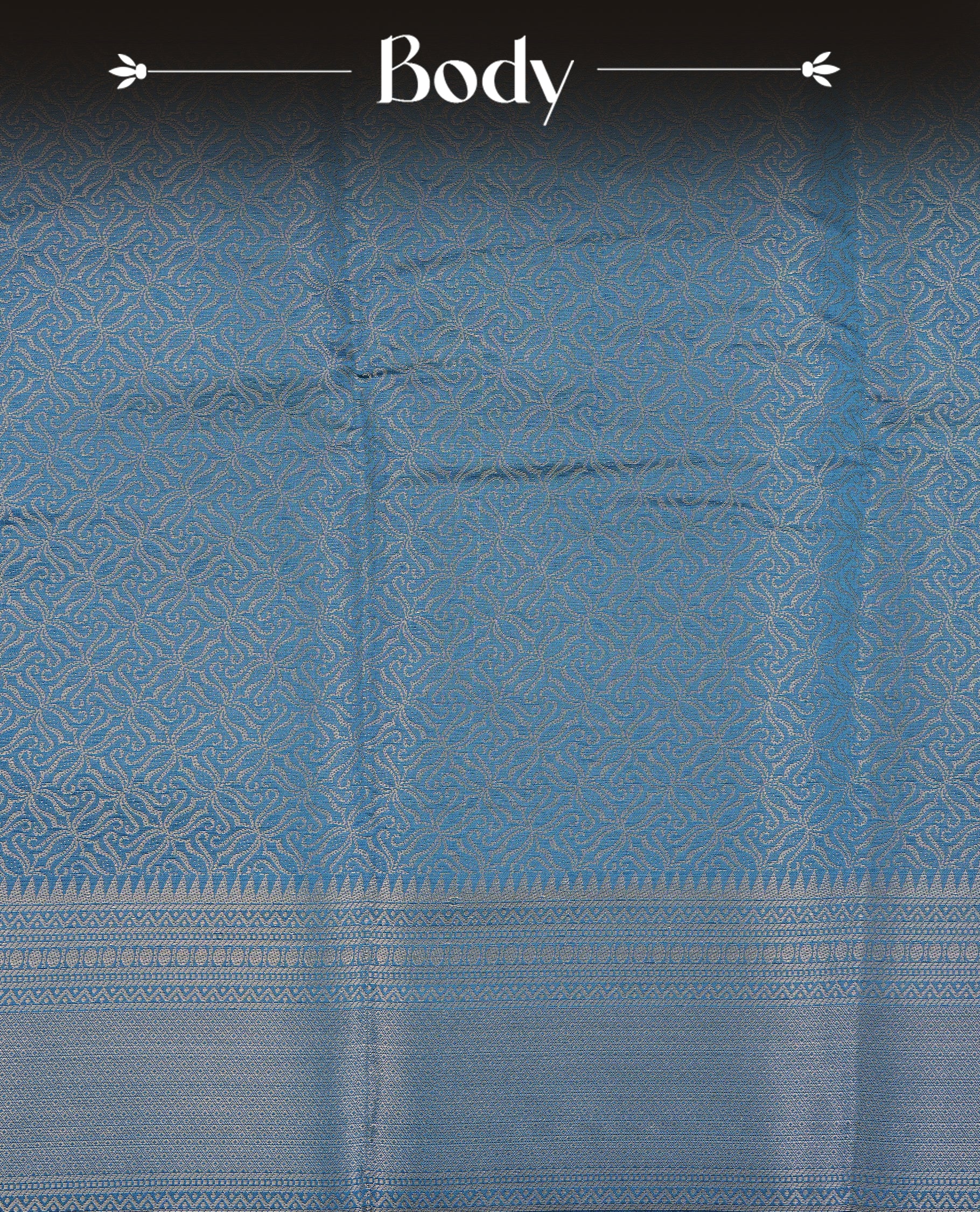 Teal colour Semi Wedding silk saree featuring gold zari kodi pattern across body, complemented by self colour with traditional border, paired with matching blouse piece.