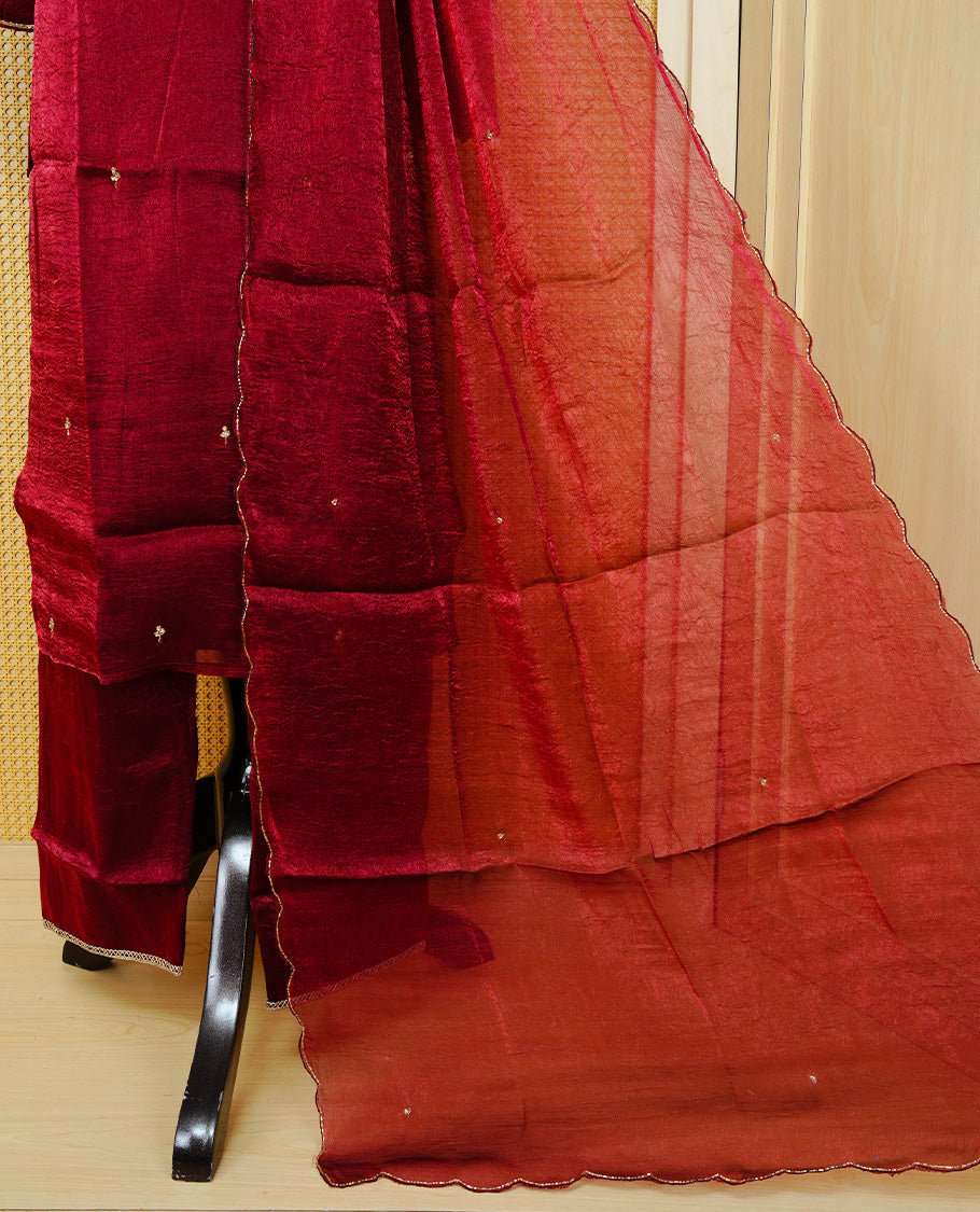 Wine red churidar set with stone and bead embroidery on the V-neckline & Body , paired with a matching embellished dupatta and solid pants.