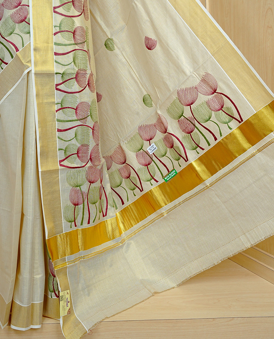 Cream colour Tissue kerala saree featuring Embroidery buttas on body, complemented by Plant thread work & kasavu kara, comes with matching blouse piece.