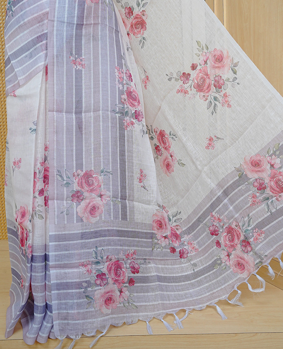 Cream colour semi linen saree featuring Red colour floral print on body, complemented by contrast Strip pattern border, comes with matching blouse piece.