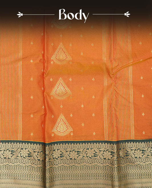 Rusted orange colour semi wedding silk saree featuring gold zari with motifs on body,contrast bottle dreen colour with traditional border on body, rich pallu comes with matching blouse piece