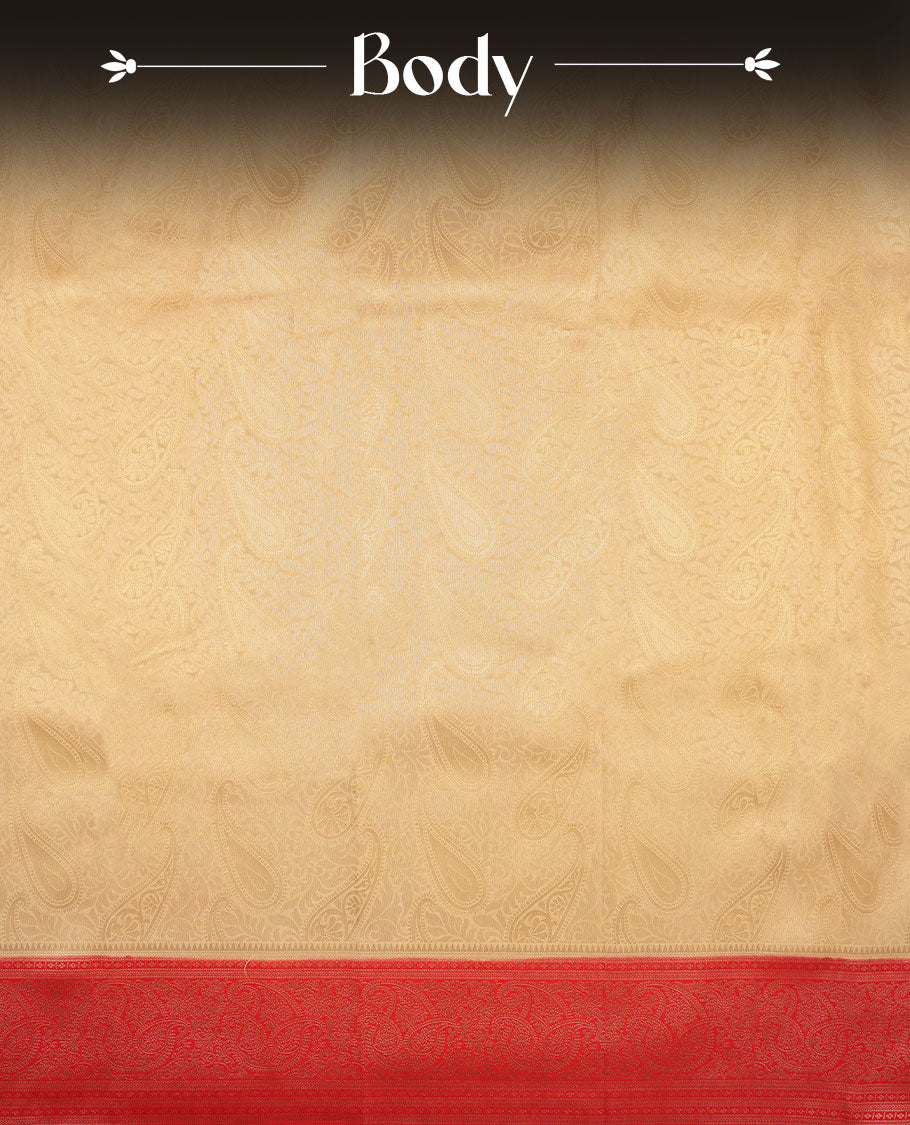 Cream colour semi silk brocade saree featuring intricate light Gold Floral kodi and leaf patterns across the body, complemented by a contrast red colour woven border and pallu, paired with a matching blouse.