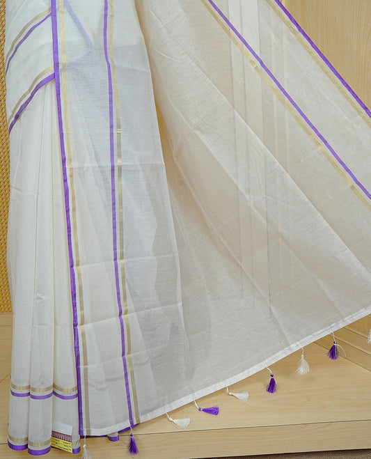 Off white colour semi linen saree featuring Elegant Plain body, complemented by contrast Purple colour with gold zari Simple border, comes with matching blouse piece.