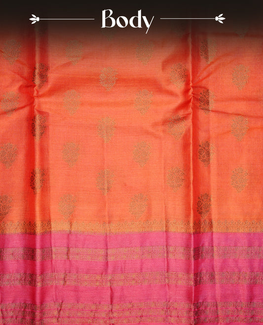 Rust orange colour pure tussar Banaras silk saree featuring elegant gold zari motifs across the body, complemented by a contrast magenta border with rich zari detailing. Comes with a matching blouse piece