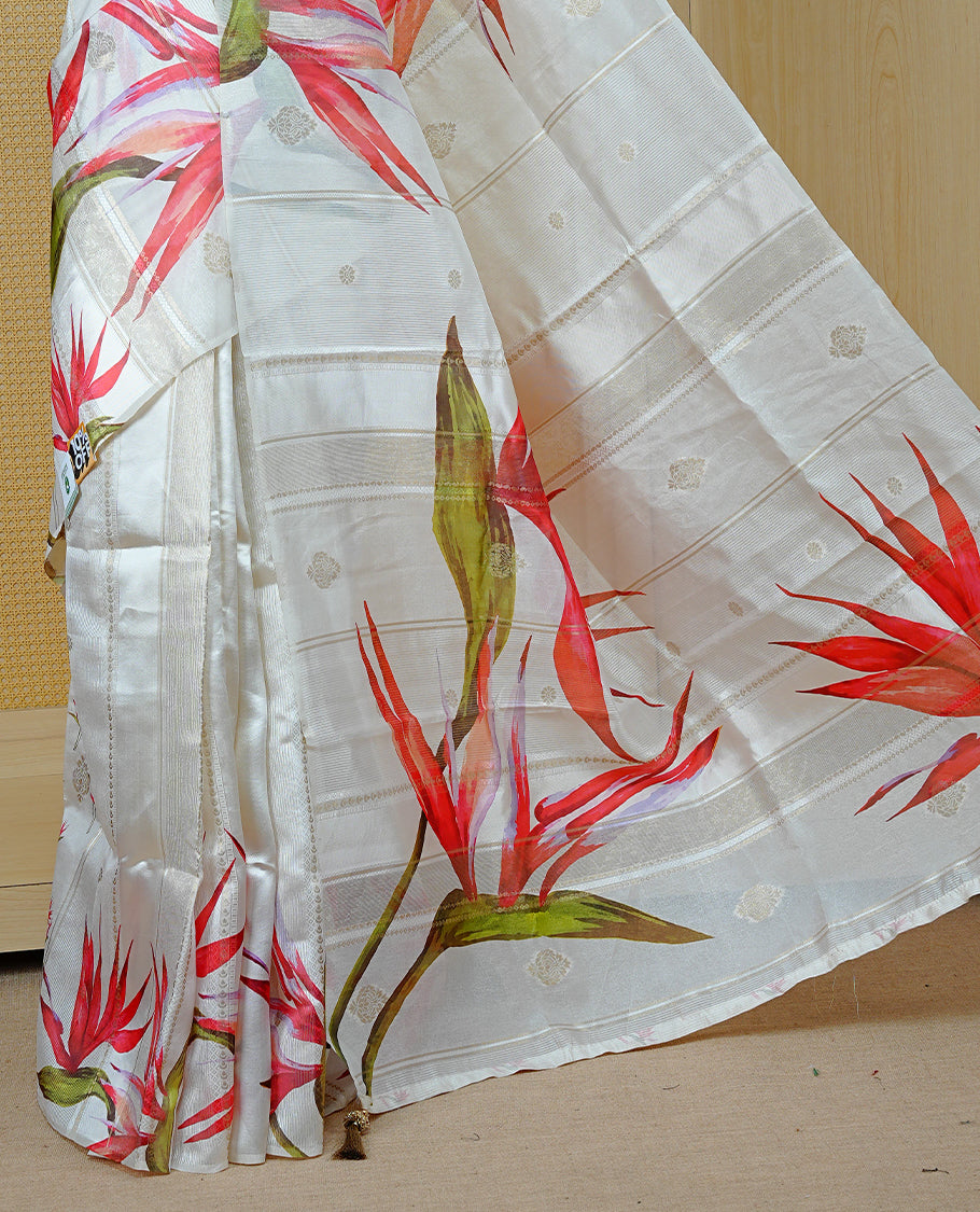 Cream Colour Organza Kerala Saree Featuring Floral Printed Motifs On The  Body & Tassels On The Pallu, Paired With A Matching Blouse Piece.