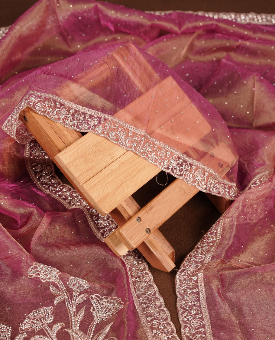 Onion pink colour churidar set with stone and thread embroidery and detailing, paired with matching pant and dupatta.