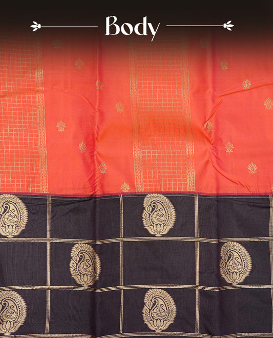 Reddish orange colour semi wedding silk saree featuring gold zari stripes with buttas on body, contrast dark  purple colour with gold zari check & motifs border on body, rich pallu comes with matching blouse piece