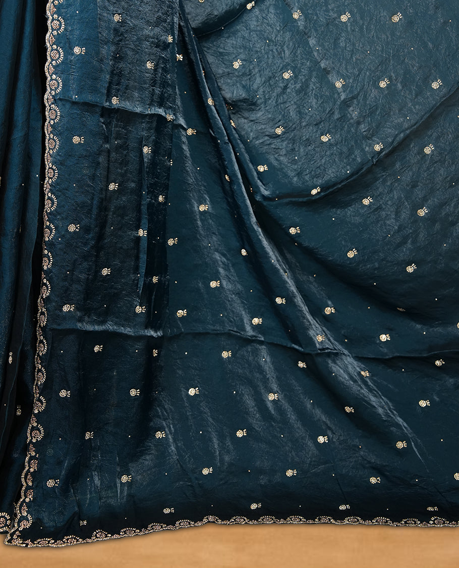 Peacock blue Colour velvet Chiffon Designer Saree featuring Delicate White Stone motifs on Body, with Stone Detailing on the Border and Pallu, paired with a Matching Blouse.