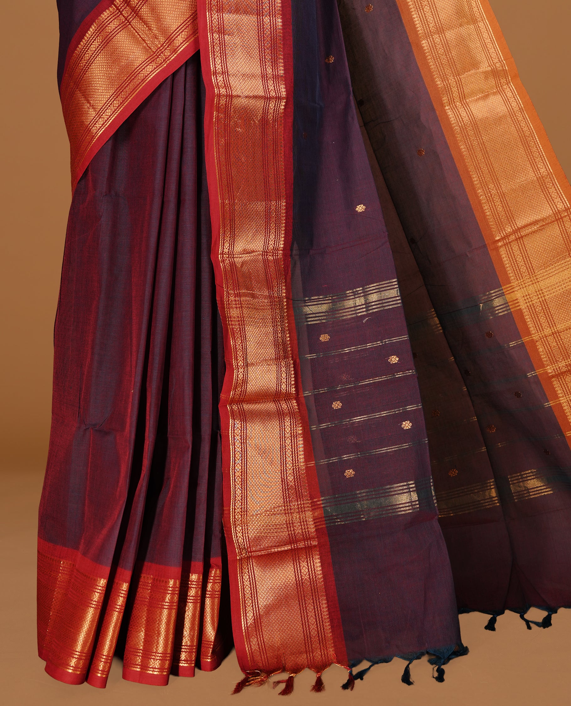 Teal & maroon colour Chettinad cotton saree featuring gold zari motifs body, complemented by contrast Maroon colour with gold zari border, paired with matching blouse piece.