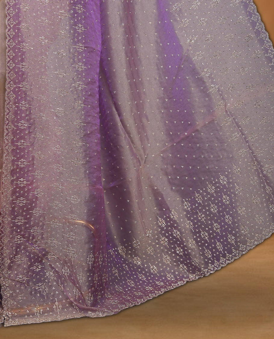 Lavender Colour Shimmer Designer Saree featuring Delicate White Stone Scattered Work on the Body, enhanced with Intricate Stone Detailing on the Border and Pallu, paired with a Matching Blouse.