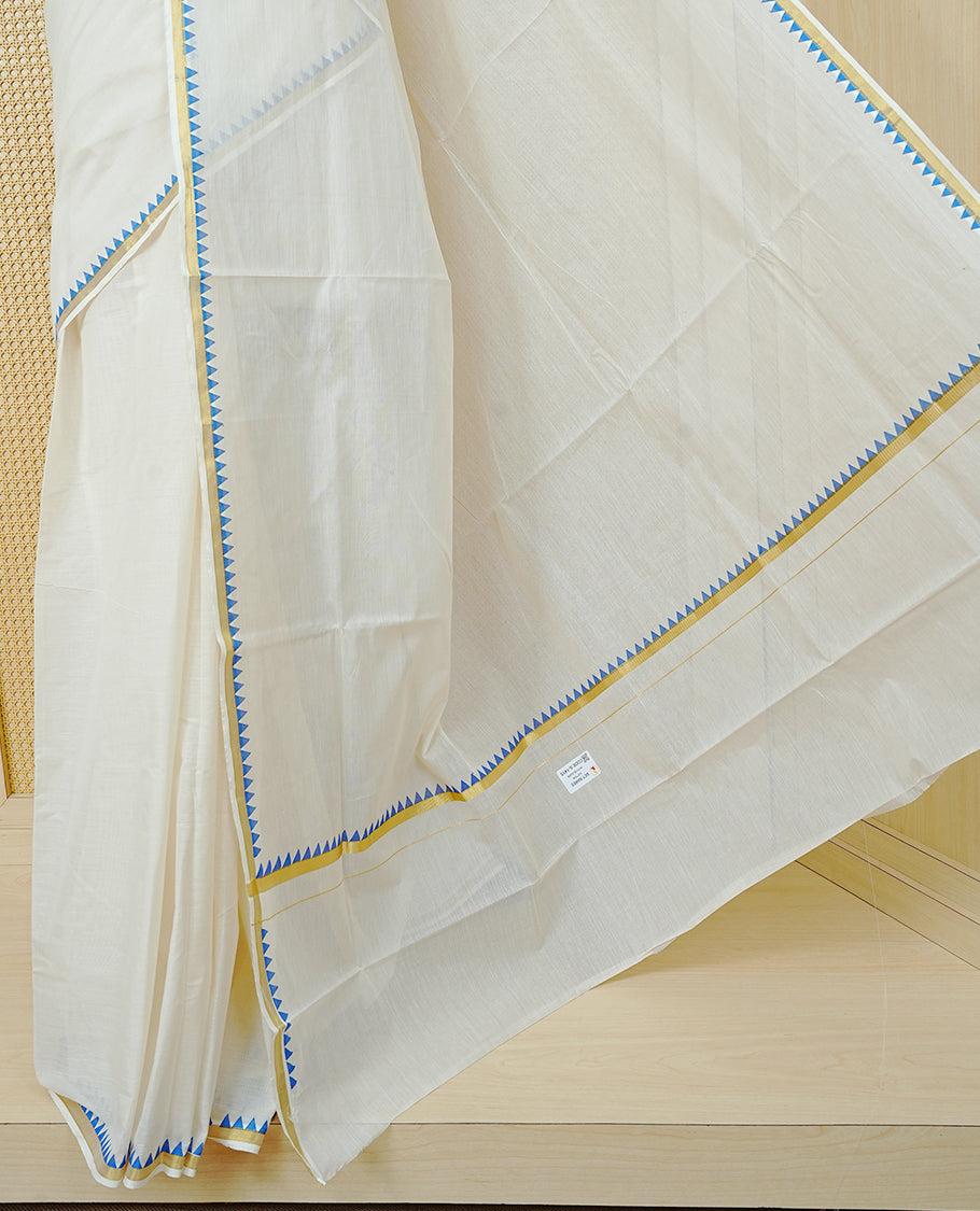 Cream Colour Cotton Kerala Saree Featuring A Gold Zari Border And Blue Temple Edging, Paired With A Matching Blouse Piece