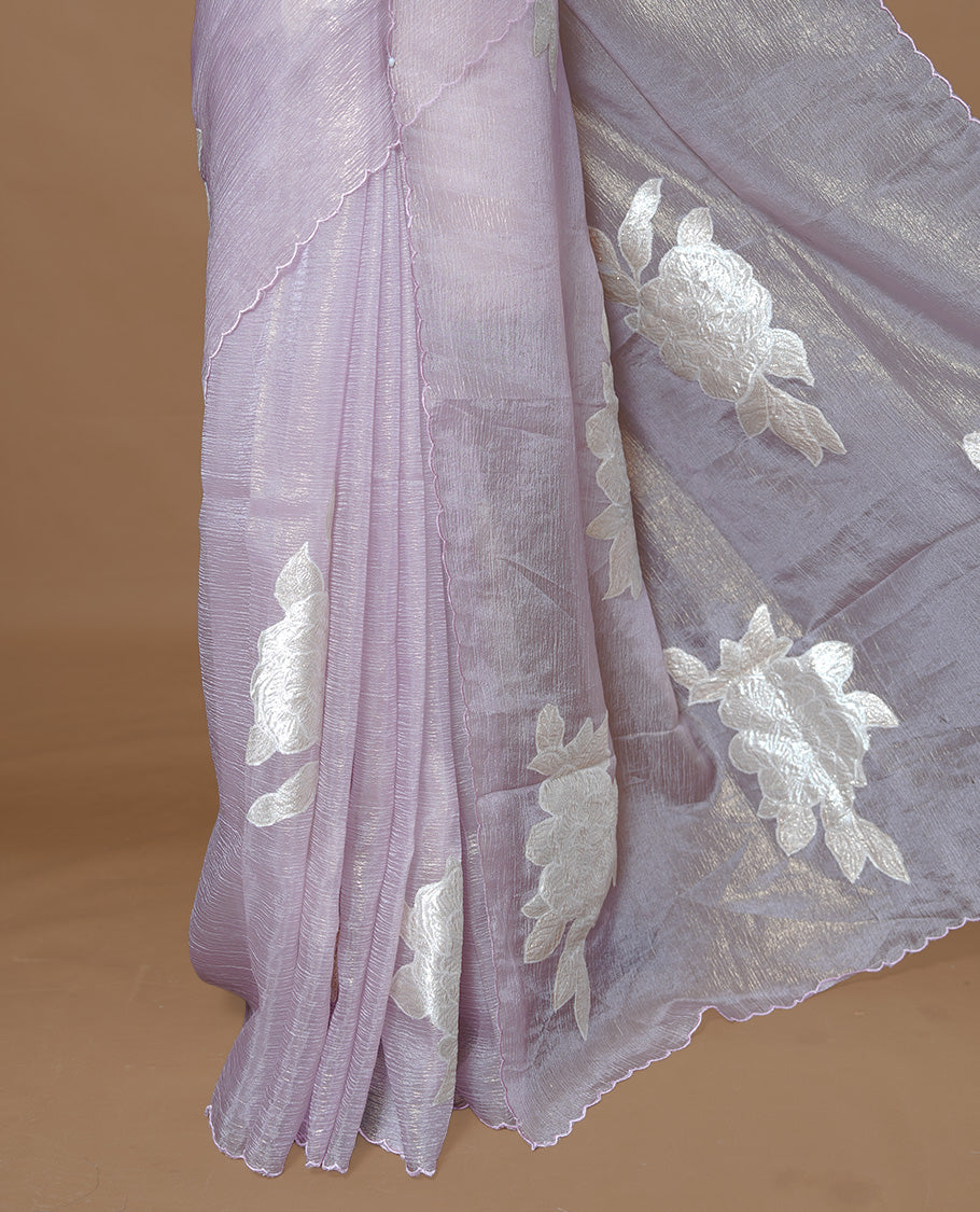 Pastel purple colour Crush Organza Saree featuring White floral Pattern on body, complemented by classy Thread border, paired with matching blouse piece.
