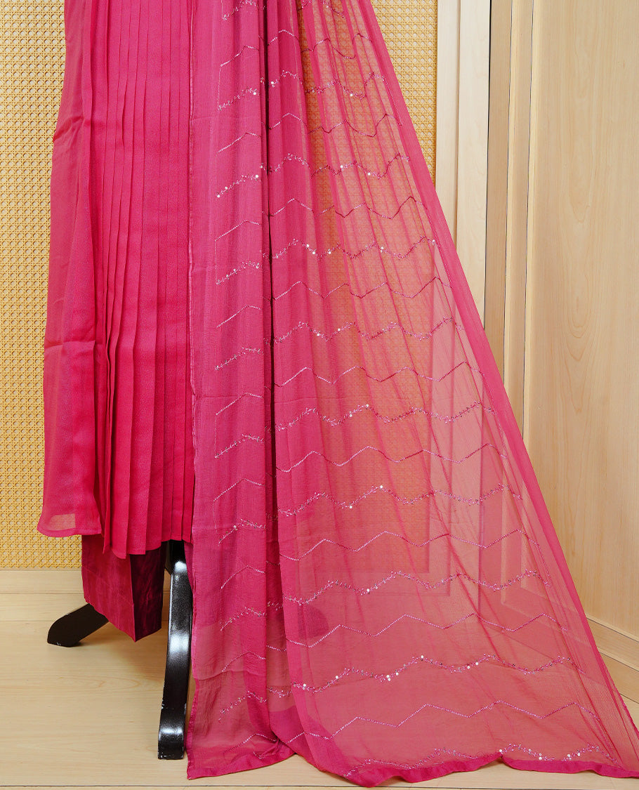 Pastel Raspberry Red Colour churidar set with sequins and bead embroidery on the round neckline, paired with a matching embellished dupatta and solid pants.
