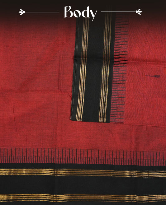Maroon Colour Chettinad Cotton Saree Featuring Plain Body, Complemented by Black With Gold Zari Border & Contrast Colour Striped Pallu, Paired with a Matching Blouse Piece.