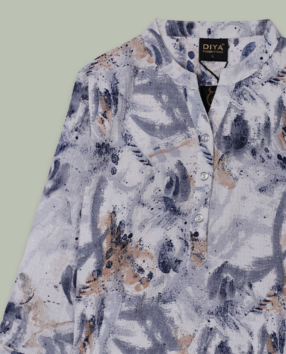 White and grey abstract printed tunic top with band collar, half button placket, three-quarter sleeves, and a curved high-low hem.