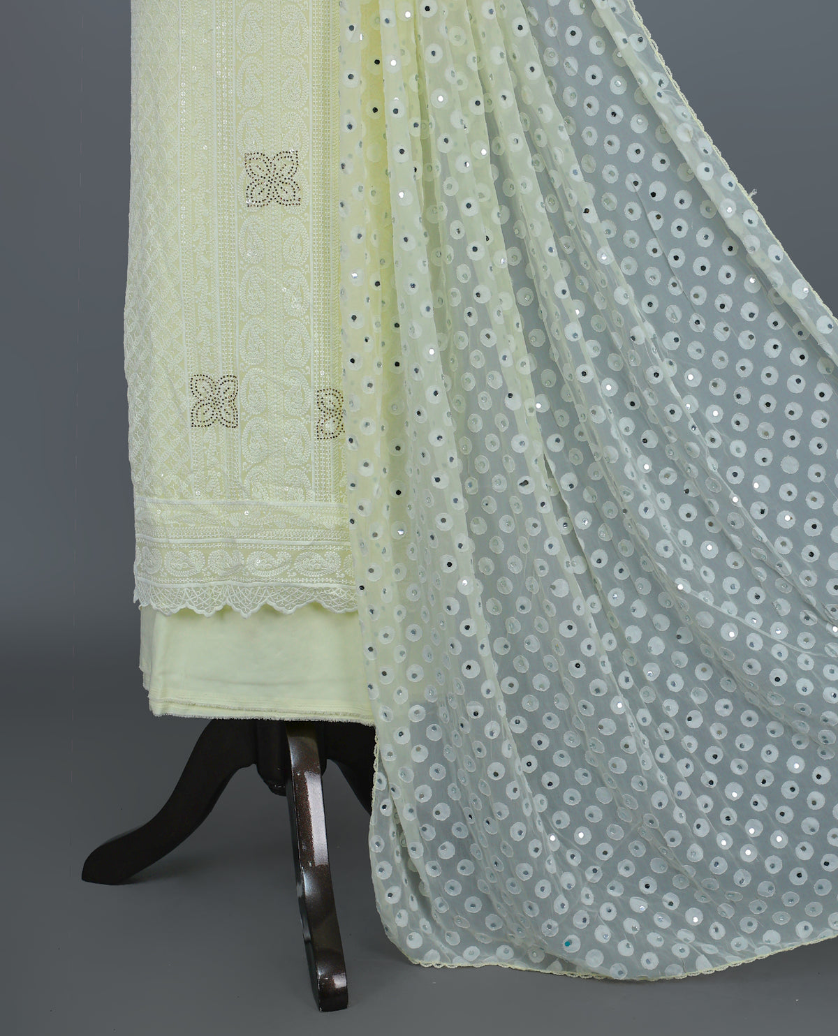 Butter Yellow Colour  Georgette Salwar Material featuring elegant Chikankari work on the kurta, paired with a matching bottom and a sequins-embellished dupatta.
