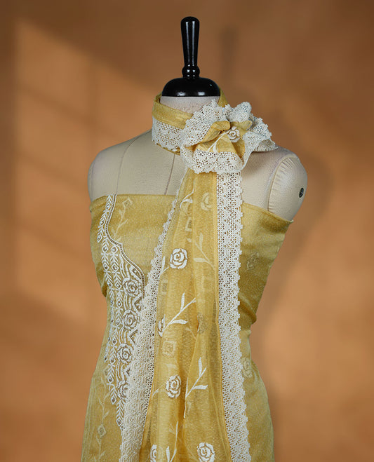 Yellow colour churidar set with off white thread embroidery and pearl detailing, paired with cotton matching pant and dupatta.
