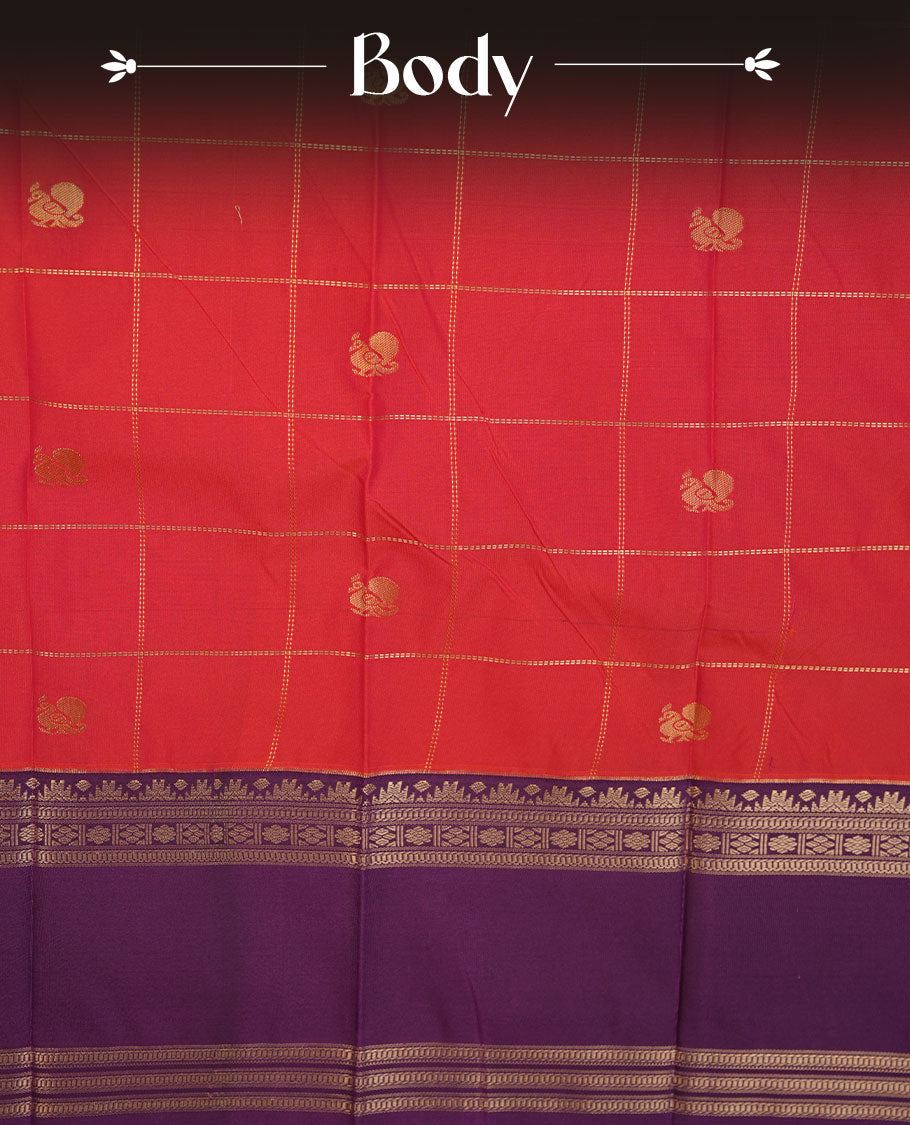 Red colour semi silk saree highlighting gold zari box pattern  and motifs across body, featuring contrast purple colour border with gold zari pattern, comes with matching blouse .