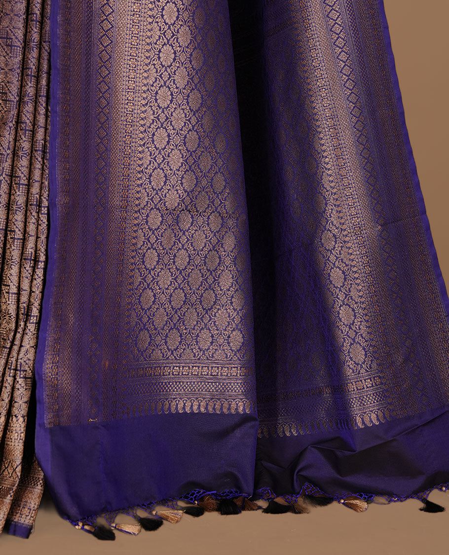 Navy blue colour semi banaras katan saree featuring Gold zari Pattern across body, complemented by self colour with zari border, paired with matching blouse piece.
