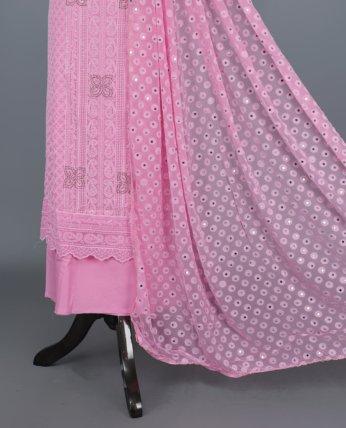 Pink Colour Georgette Salwar Material featuring elegant Chikankari work on the kurta, paired with a matching bottom and a sequins-embellished dupatta.