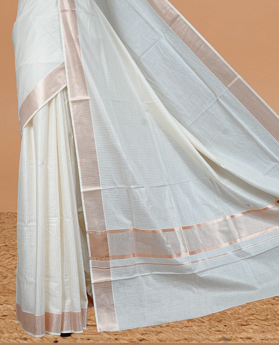 Cream colour Kerala saree featuring Rose Gold stripes on body, enrich by classy zari Border, pallu ,comes with matching blouse piece.