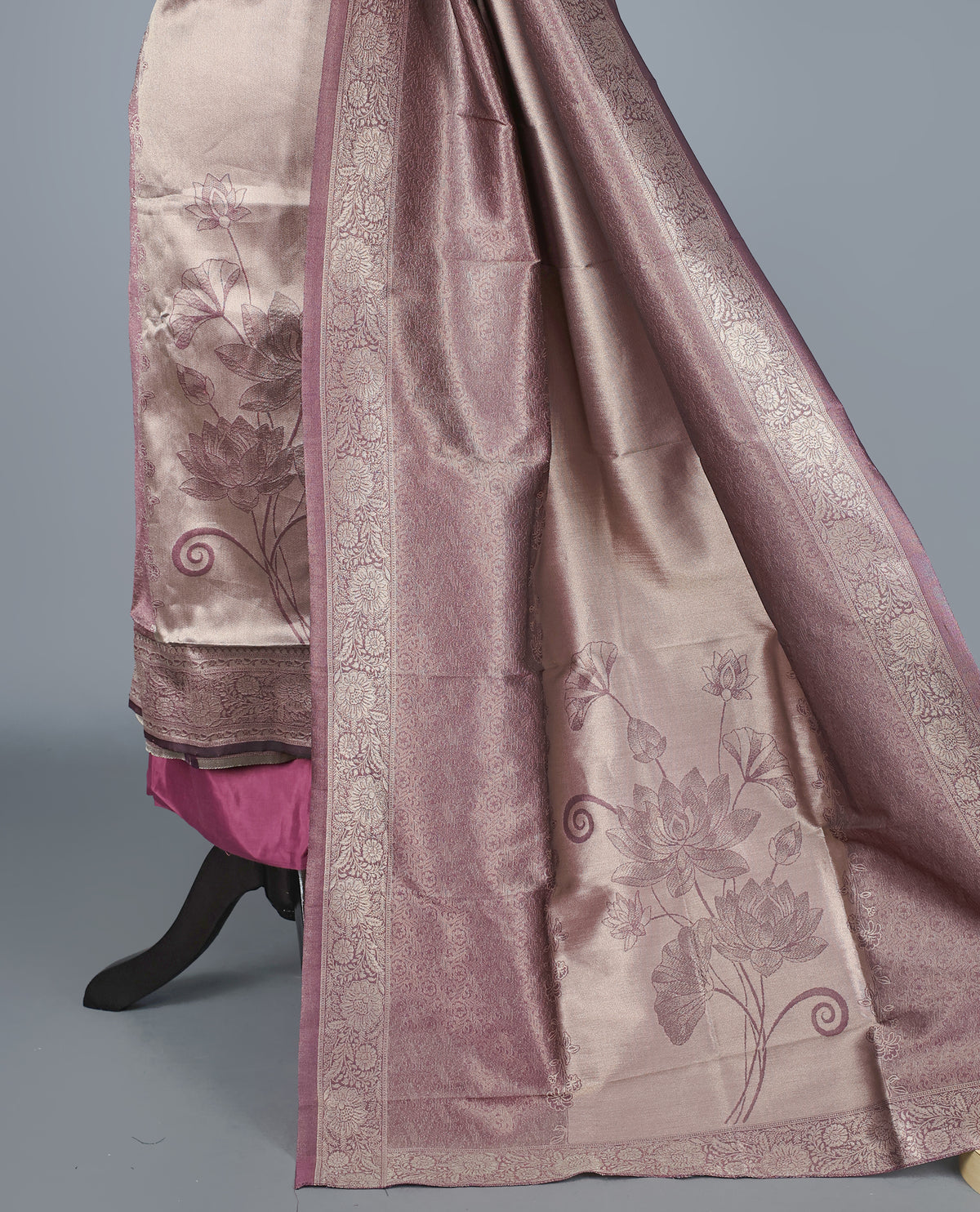 Purple Colour Tissue Salwar Material featuring elegant lotus floral motifs on the front panel, paired with a matching bottom and dupatta for a timeless, sophisticated look.