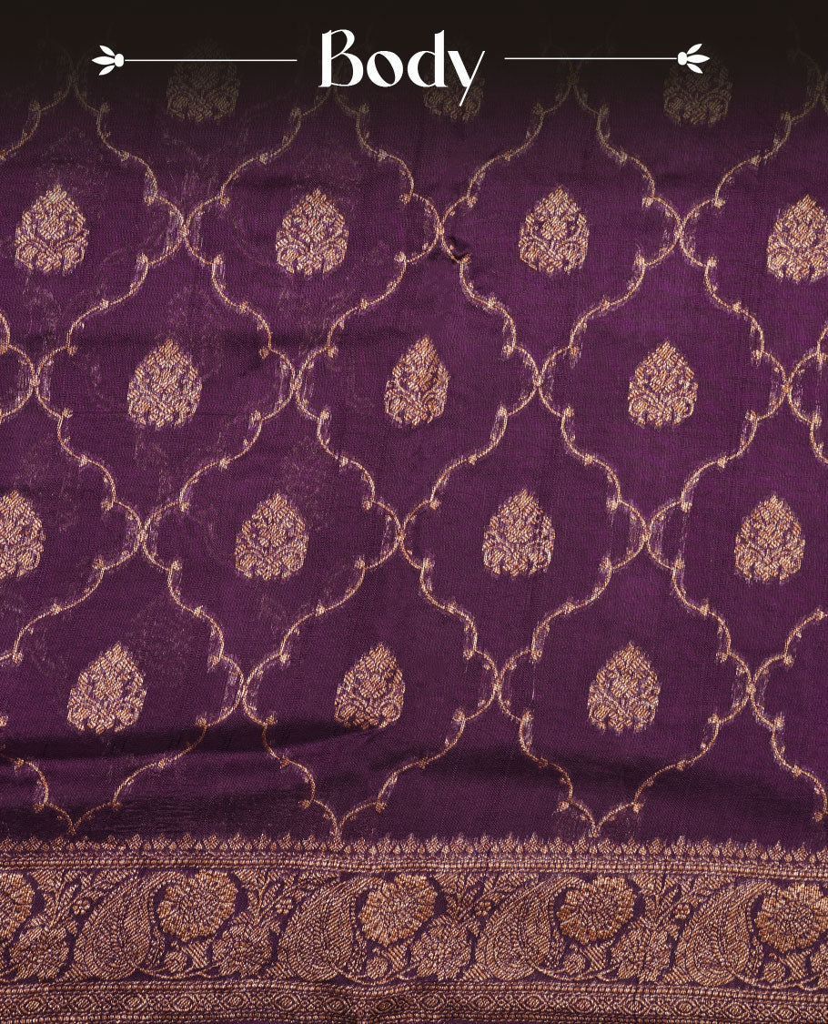 Grape purple colour semi Banaras saree with gold zari buta motifs, finished with a traditional gold zari border and pallu, paired with a matching blouse.
