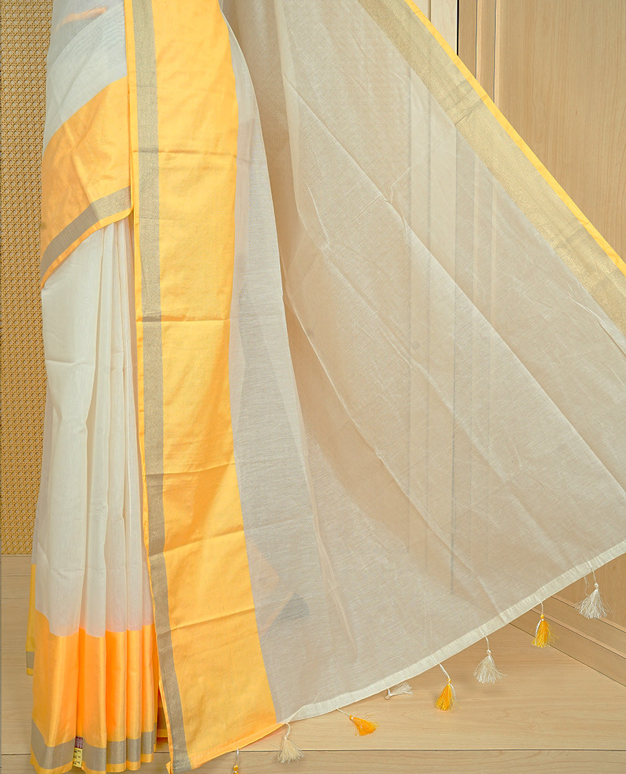 Cream colour Cotton kerala Saree featuring Plain body, Big yellow & gold kasavu border, comes with matching blouse piece.