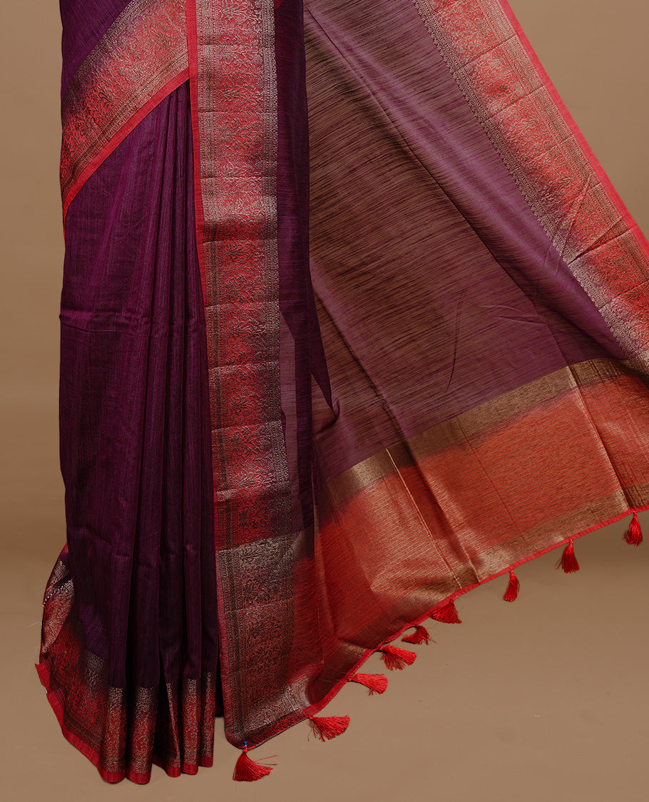 Maroon colour Semi linen saree featuring Elegant plain body, complemented by contrast Red colour With Antique zari border, paired with matching blouse piece.