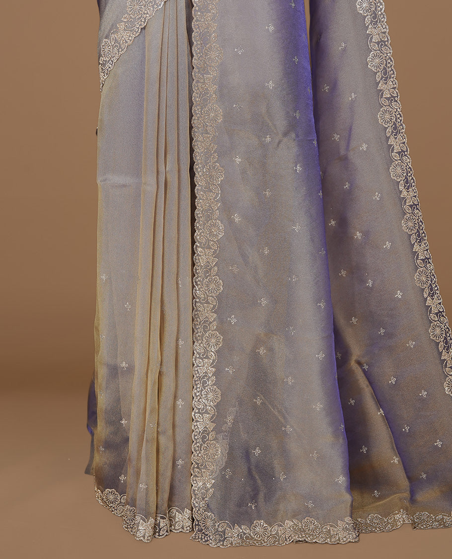 Lavender colour designer saree featuring stone worked body, stone worked border, paired with matching blouse piece.