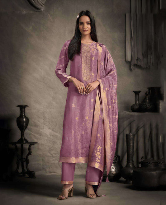 Lavender colour suit material featuring an Akina silk jacquard top with delicate embroidery, paired with satin bottoms and completed with a matching Akina silk jacquard dupatta