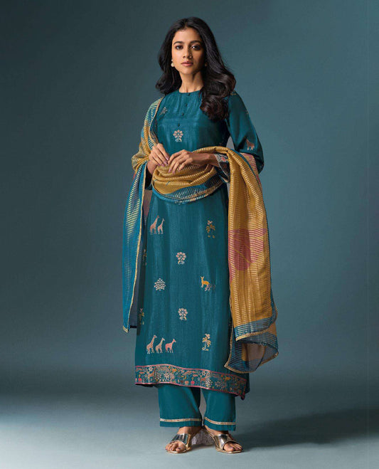 Teal colour suit material with Olivia silk jacquard top featuring elegant digital prints, paired with classic silk bottoms, and completed with a silk jari lining dupatta highlighted by digital prints