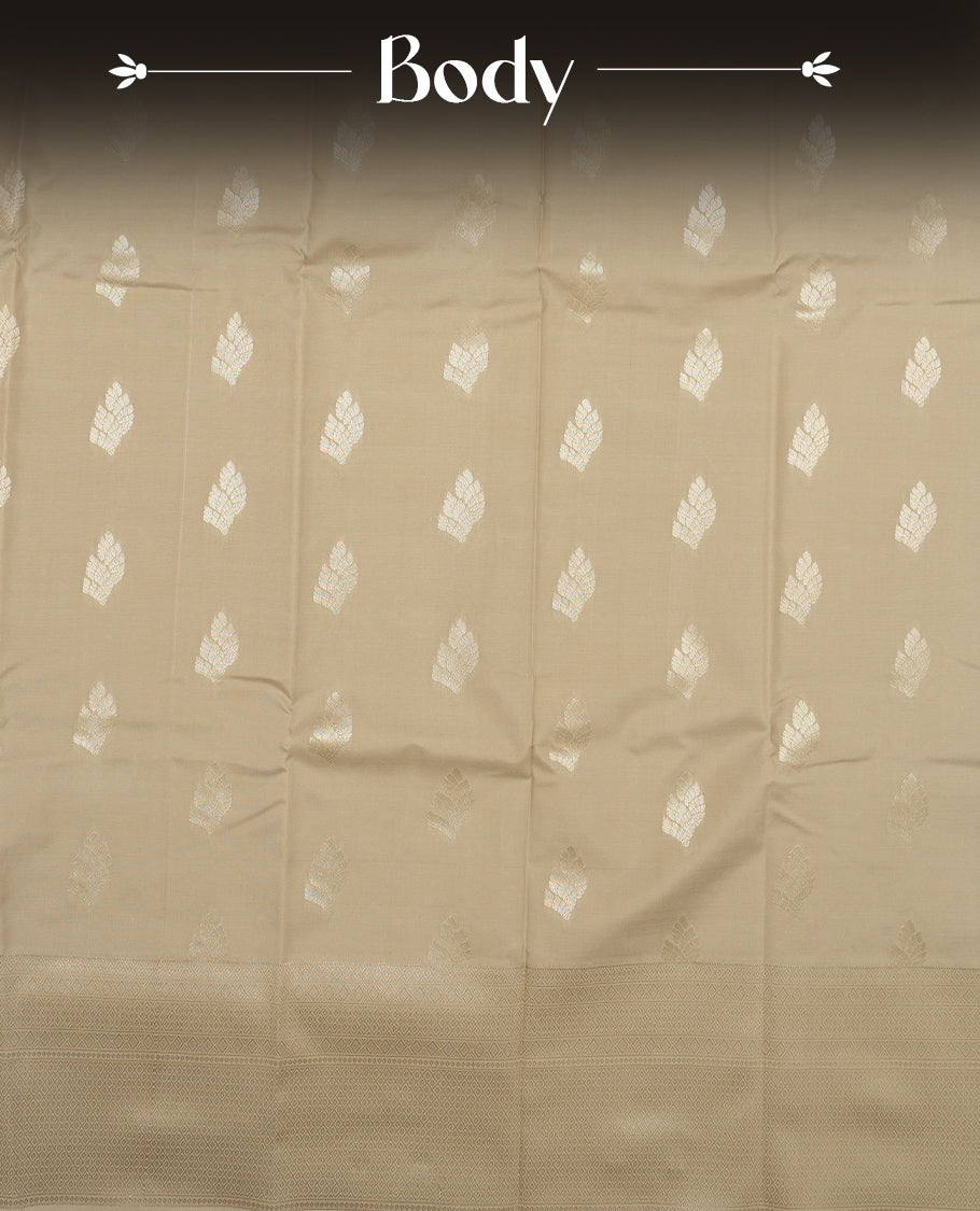 Agreeable gray colour semi soft silk saree featuring a gold Leaf textured patterned body, complemented by gold traditional tiny diamond pattern pallu & border and a matching blouse piece.