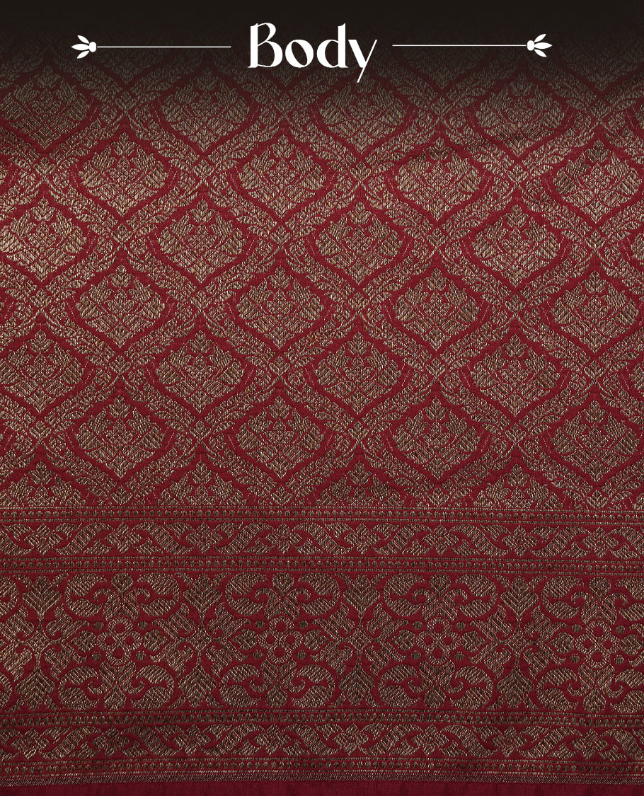 Maroon Colour Semi Banarasi Katan Silk Saree with Gold Zari Buti Motifs, Traditional Gold Floral Pallu, Elaborate Woven Border, Decorative Tassels with Matching Blouse