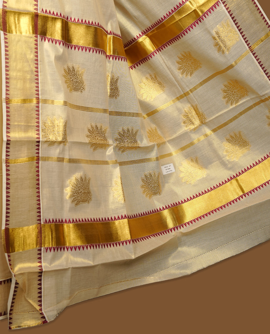 Elegant Light gold colour tissue Kerala saree with gold zari buttas, broad kasavu border with maroon temple design, and richly woven traditional pallu, paired with a matching blouse