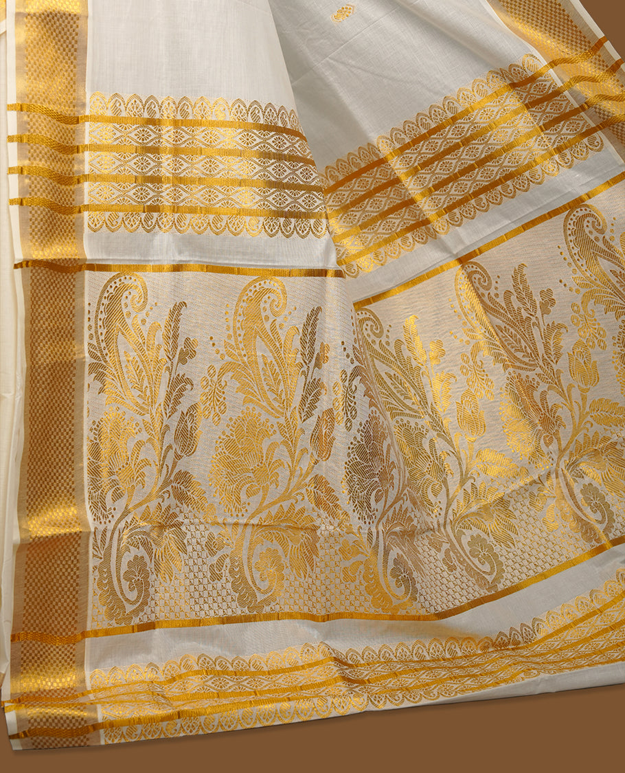 Elegant White colour cotton Kerala saree with gold zari buttas, broad kasavu border, and richly woven traditional pallu, paired with a matching blouse