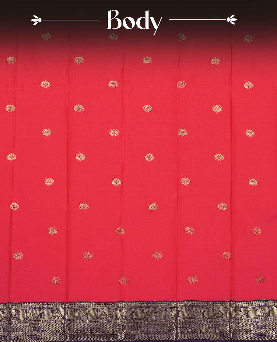 Dark pink colour Semi Silk Saree with gold zari motifs on the body, paired with a contrasting dark purple traditional pallu and border featuring peacock motifs, and completed with a matching blouse piece.