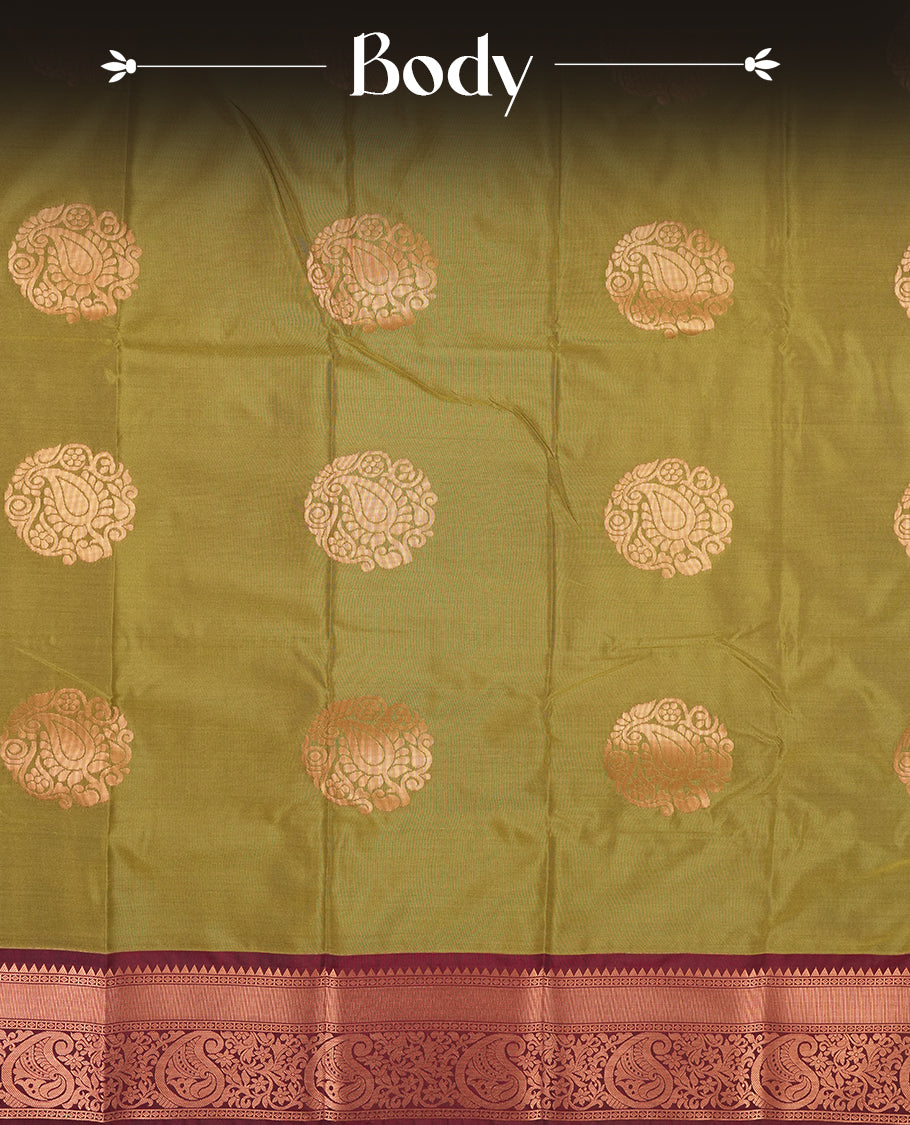 Mehandi colour Semi Silk Saree with copper zari stripes on the body, paired with a contrast dark brown colour pallu with copper zari traditioal border, and a matching blouse piece.