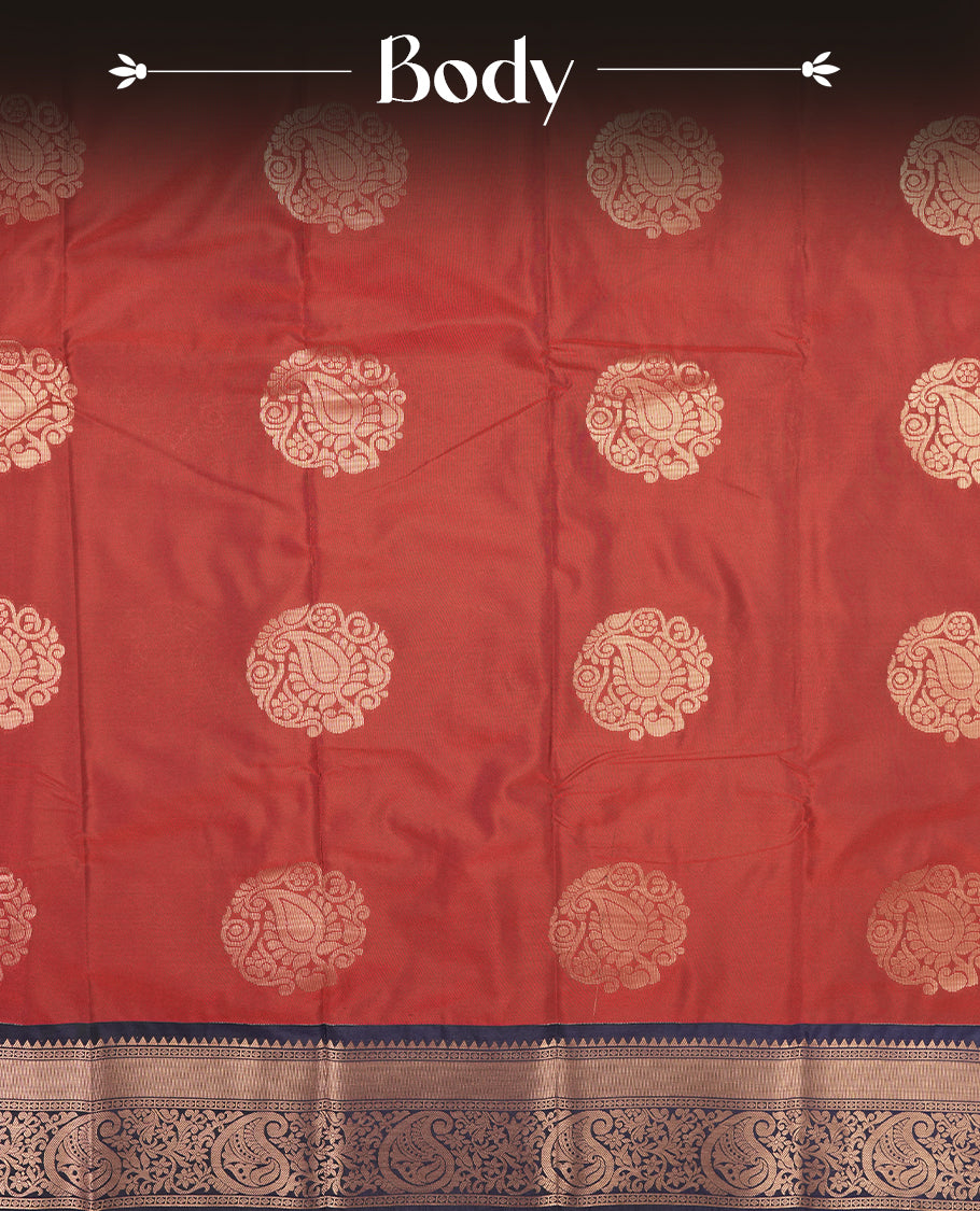 Burgundy colour Semi Silk Saree with gold zari motifs on the body, paired with a contrast Dark blue colour pallu with copper zari traditioal border, and a matching blouse piece.