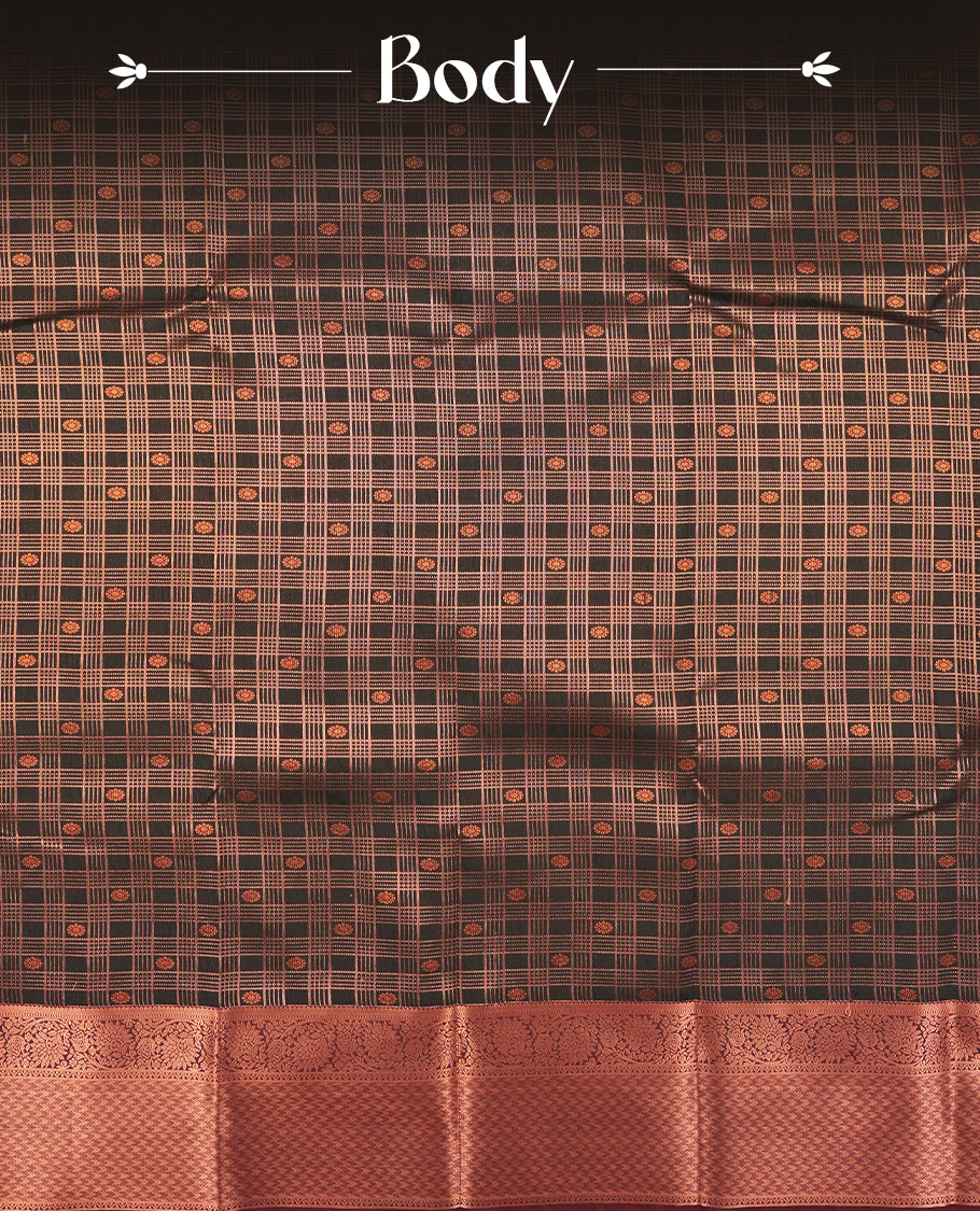 Black colour Semi Silk Saree with copper zari checkered on the body, paired with a contrast chocolate brown colour pallu with coppper zari traditioal border, and a matching blouse piece.