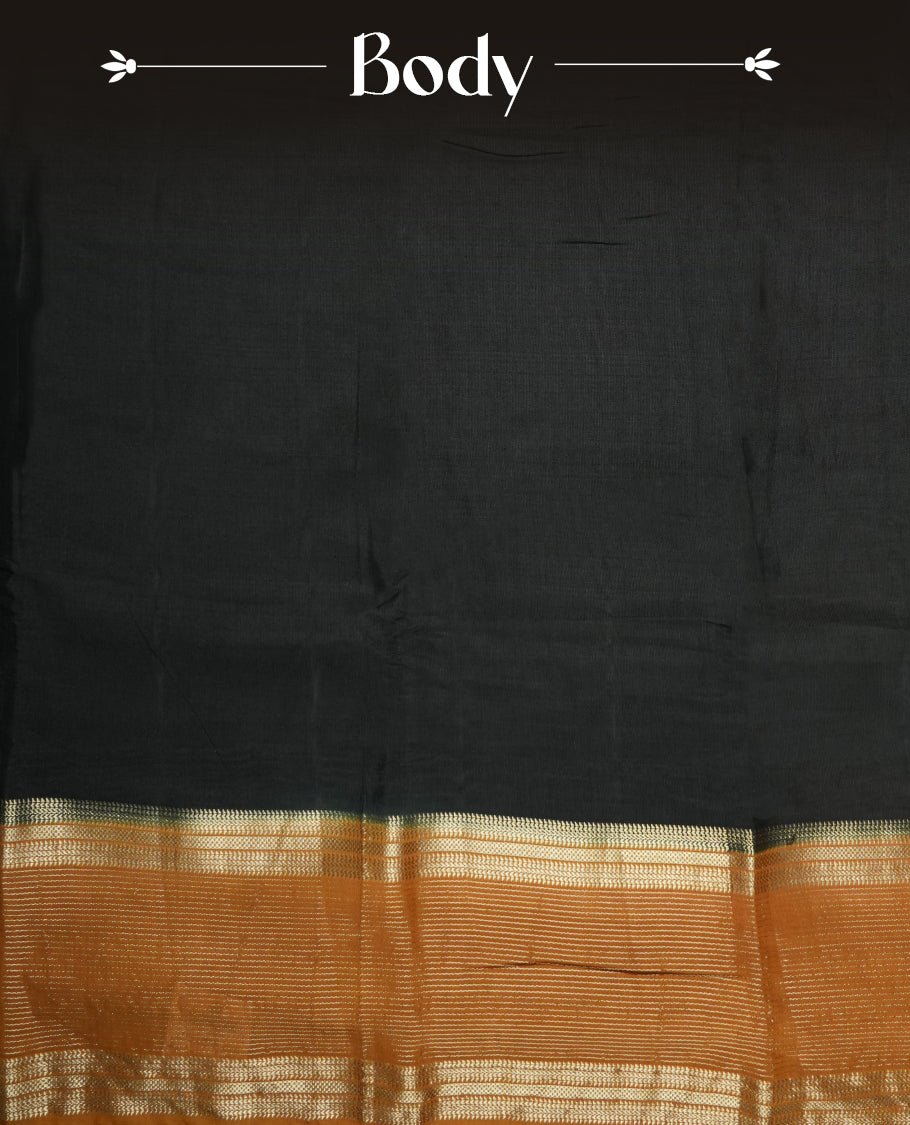 Black chanderi cotton saree featuring plain body, mustard orange pallu with gold zari border, matching mustard orange blouse.