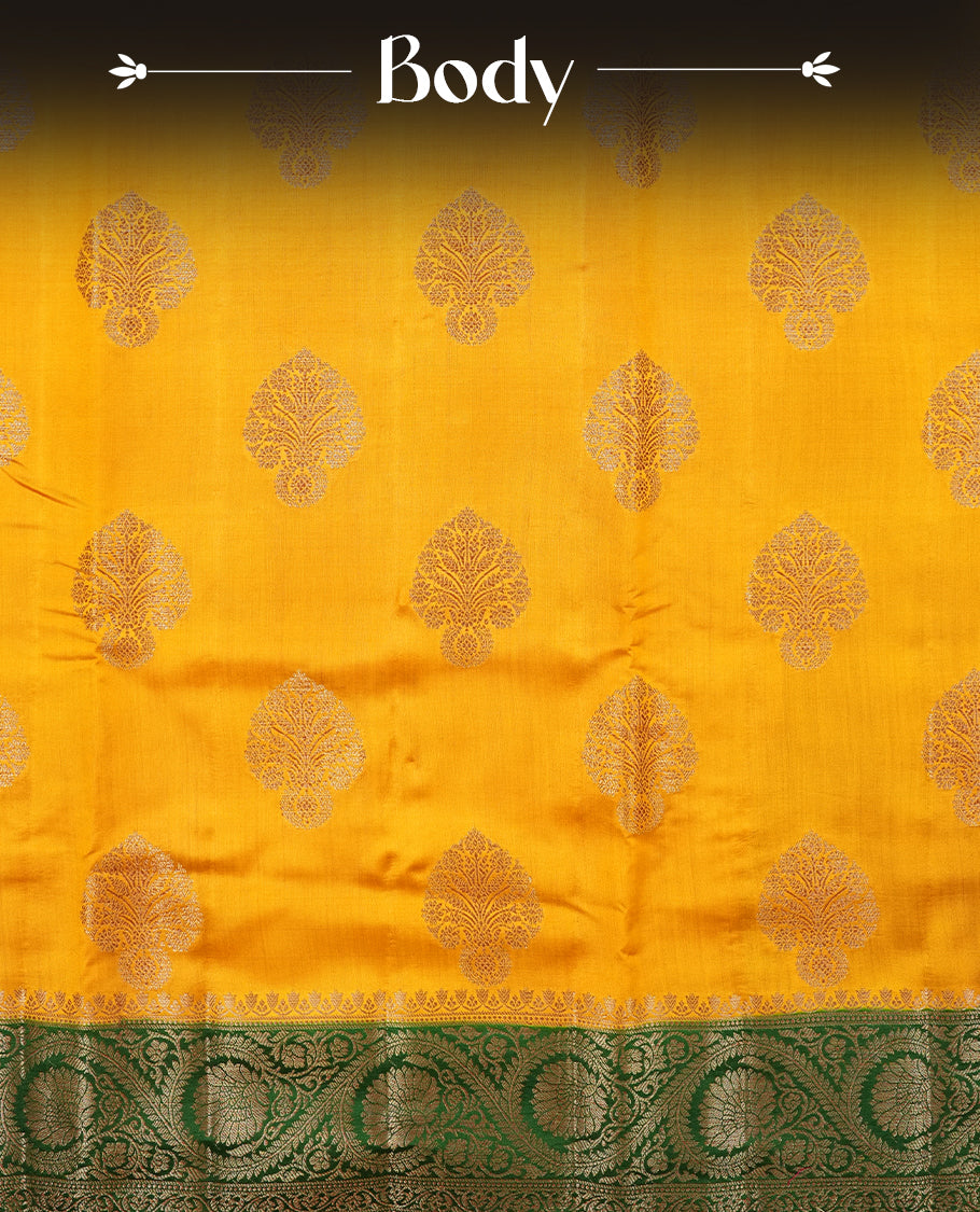 Mustard Colour Pure Banaras soft Silk Saree having gold floral motifs on Body with contrast green colour gold Floral kodi pattern on Border and matching Blouse