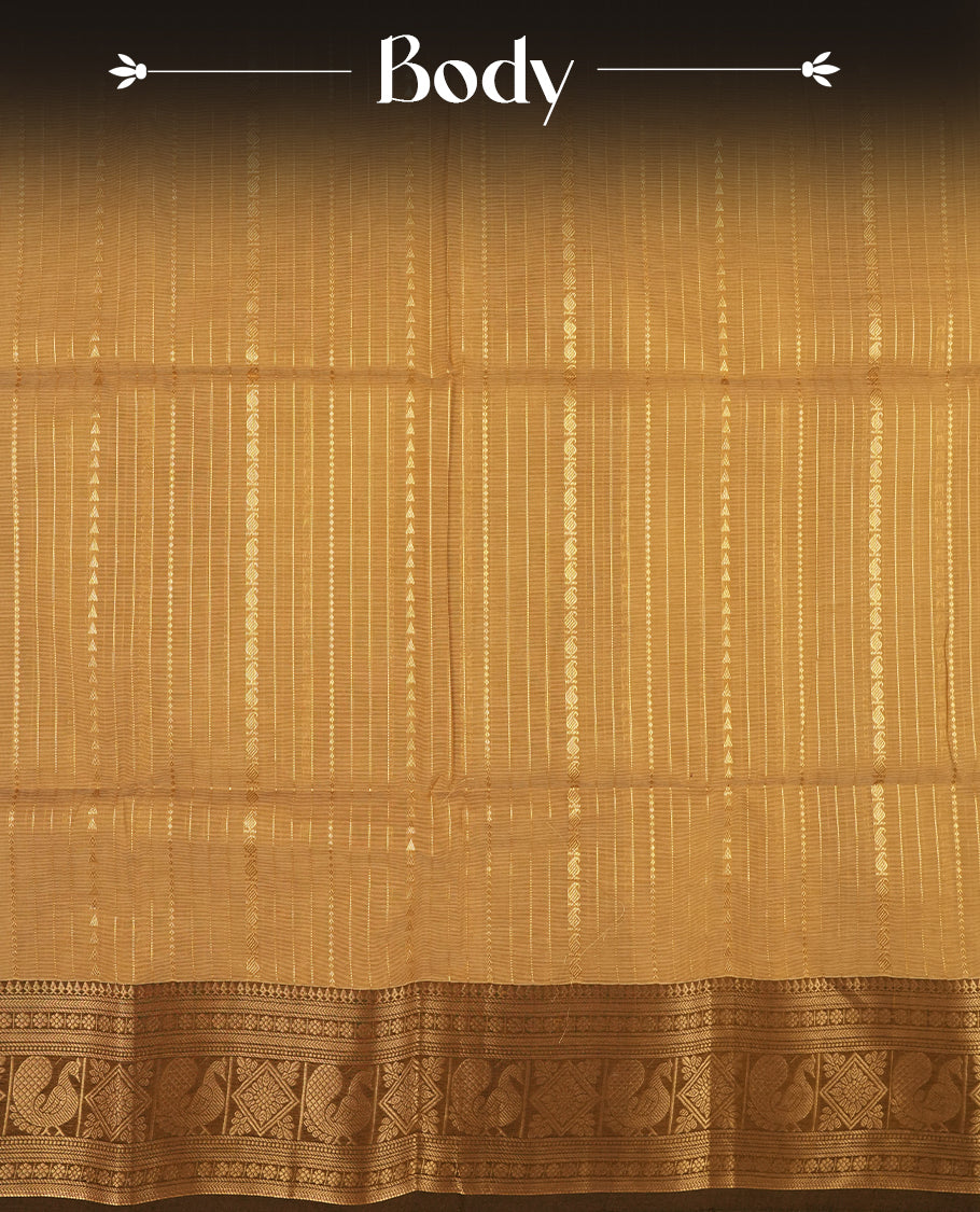 Pastel brown colour Chettinad cotton saree featuring small zari striped motifs on the body, complemented by a rich golden zari woven border with intricate traditional pattern & Comes with a matching blouse piece.