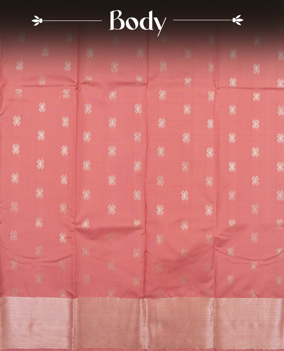Dusty rose colour semi soft silk saree featuring a golden textured patterned body, complemented by self coloured golden zari motifes on pallu & border and a matching blouse piece.