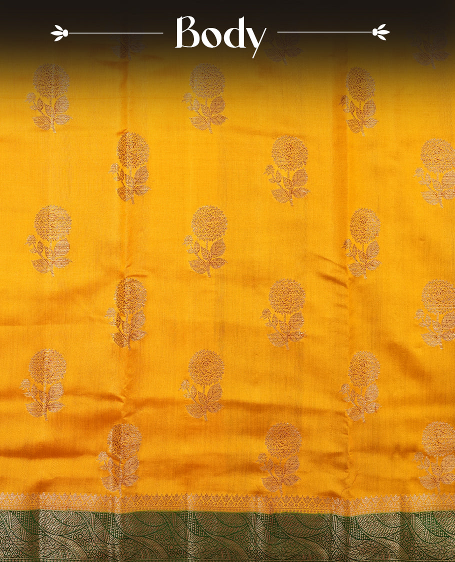 Mustard Colour Pure Banaras soft Silk Saree having gold floral motifs on Body with contrast green colour gold zari Border and matching Blouse